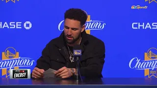 Klay Thompson making paper airplane during interview