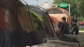 Homeless campers around City Hall form their own armed 'security detail'