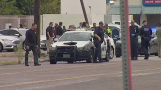 Police: Dallas officer shot while responding to shooting call, suspect is currently on run