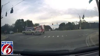 Video shows Florida ambulance overturning in crash with bus, pickup; 15 injured