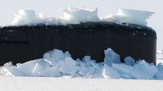 Submarine BREAKS THROUGH THICK POLAR ICE! (Amazing footage!)