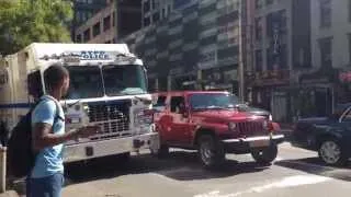 NEWER NYPD BOMB SQUAD TRUCK CRUISING BY ON W. 42ND ST. IN HELL'S KITCHEN, MANHATTAN, NEW YORK CITY.