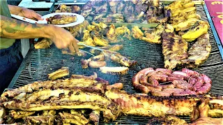 Street Food in Italy. Roasted Piglets, Ribs, Grilled Sausages, Superloaded Sandwiches