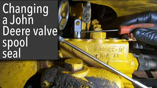 How to replace John Deere 410G spool valve seal