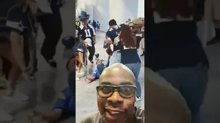 Dallas fan dragging Rams fans