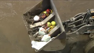 Bulldozers Help Rescue Residents Trapped by Mud After Storm