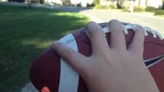 How to throw a football in a perfect spiral