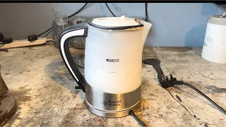 Tear down kettle stripping and scraping ready to melt all metals