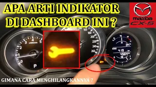 APA ARTI INDIKATOR KUNCI WARNA ORANYE DI MID DASHBOARD MAZDA CX-5 ?