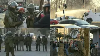 Demonstrators arrested, dispersed with water cannons at Chile's Plaza Italia | AFP