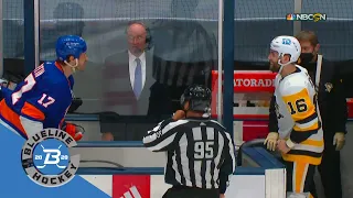 Matt Martin and Jason Zucker chirp across the bench after second scrum of the game.