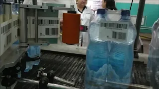 Маркировка воды. Нанесение этикетки на групповую упаковку. Автоматический принтер-аппликатор Н-ПР-02