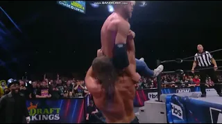 Big Bill chokeslams Orange Cassidy through table