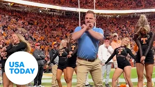 Busted! Fake security guard dances during Tennessee football game | USA TODAY