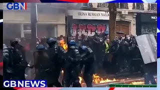 Police clash with protesters on the streets of Paris during May Day demonstrations