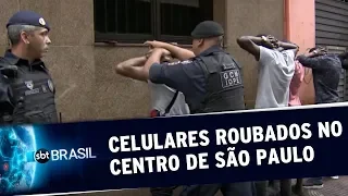 Operação prende africanos que compravam celulares roubados no Centro de SP | SBT Brasil (18/12/19)