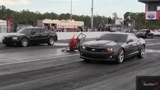 Chrysler 300 SRT8 w/Nitrous vs. 2012 Camaro SS 6 Speed - Drag Race Video - Road Test TV ®