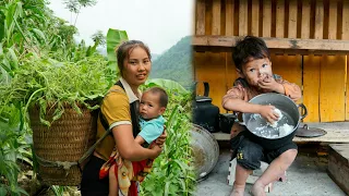 Chuc Thi Duong harvests green vegetables to sell at the market - it's so warm that the boy is back