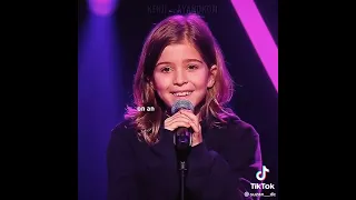 little girl singing on another love