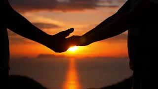 Love Couple Holding Hands at Sunset