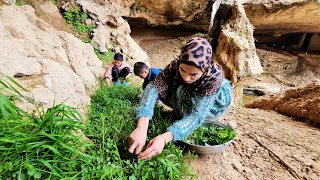 Nasrin picks vegetables from the garden next to the waterfall