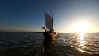 Ancient wooden boat sailing