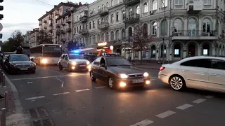 7 police cars and 14 cars of National guard of Ukraine with horns,siren and lights