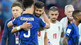 USA's Antonee Robinson consoles tearful Ramin Rezeian after Iran were dumped out of the World Cup