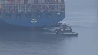 Tugboats escort ship that caused deadly Baltimore bridge collapse back to port