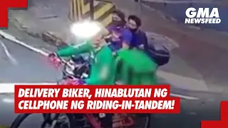 GMA News Feed: Delivery biker, ninakawan ng cellphone ng riding-in-tandem!