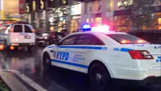 NYPD CRUISER RESPONDING URGENTLY WITH SOME RUMBLER SIREN ON BROADWAY IN TIMES SQUARE, NYC.