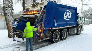 Brand New LRS Rear Loader Garbage Truck in the Snow