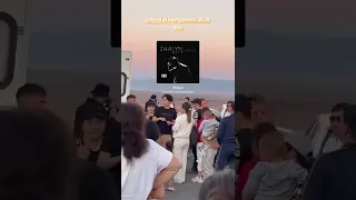 Dimash on shooting set with fans