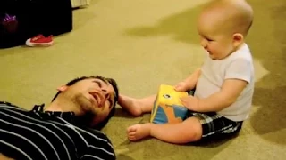 Baby laughing at Daddy sneezing