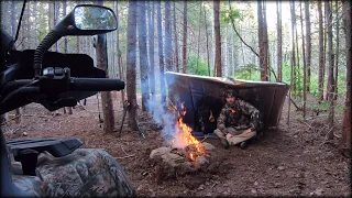 Solo Bushcraft with ATV camping Overnight under a Tarp! (Fire pit, Axe, Cooking Italian Sausage)