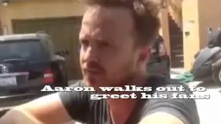Aaron Paul Greets Tourists Outside his home