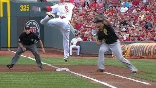 Hamilton avoids the tag, reaches on bunt hit