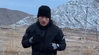 DMITRY BIVOL OLD SCHOOL MOUNTAIN TRAINING SHADOW BOXING WITH ROCKS IN EACH HAND