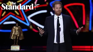 Harry makes surprise appearance at Las Vegas NFL award ceremony after visiting King for 45 minutes