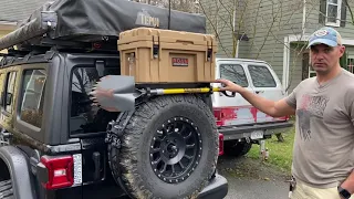 Spare tire cargo carrier for a shovel and a roam box
