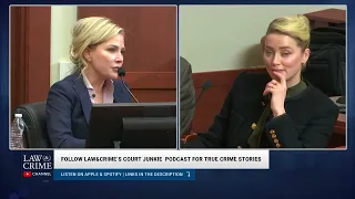 Amber Heard smirking in Trial