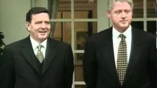 Clinton and Gerhard Schroeder speaking about military strikes in Kosovo