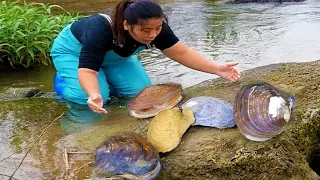 Freshwater giant clams, filled with unique pearls, have brought me wealth