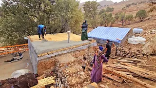 "The Unbreakable Bond: A Family's Journey in Cementing Jan Bibi's Nomadic Roof"