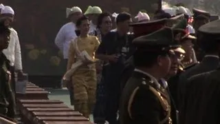 Suu Kyi makes symbolic debut at Myanmar army parade