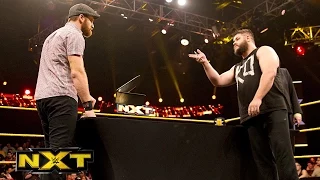 Sami Zayn and Kevin Owens sign the contract for their match at TakeOver: WWE NXT, January 28, 2015