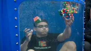 World Record! 8 Rubik's Cubes Solved Underwater