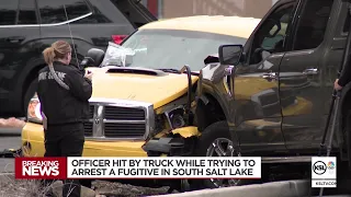 Officer hit by truck while trying to arrest fugitive in South Salt Lake