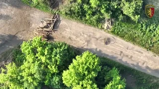 Drone drops improvised munitions on russian soldier