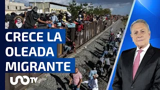 Migrantes de todo el mundo esperan documentos para seguir su viaje a EU